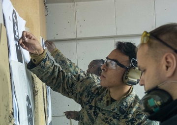 FASTEUR Marines and Latvian Internal Security Bureau Practice Pistol Marksmanship