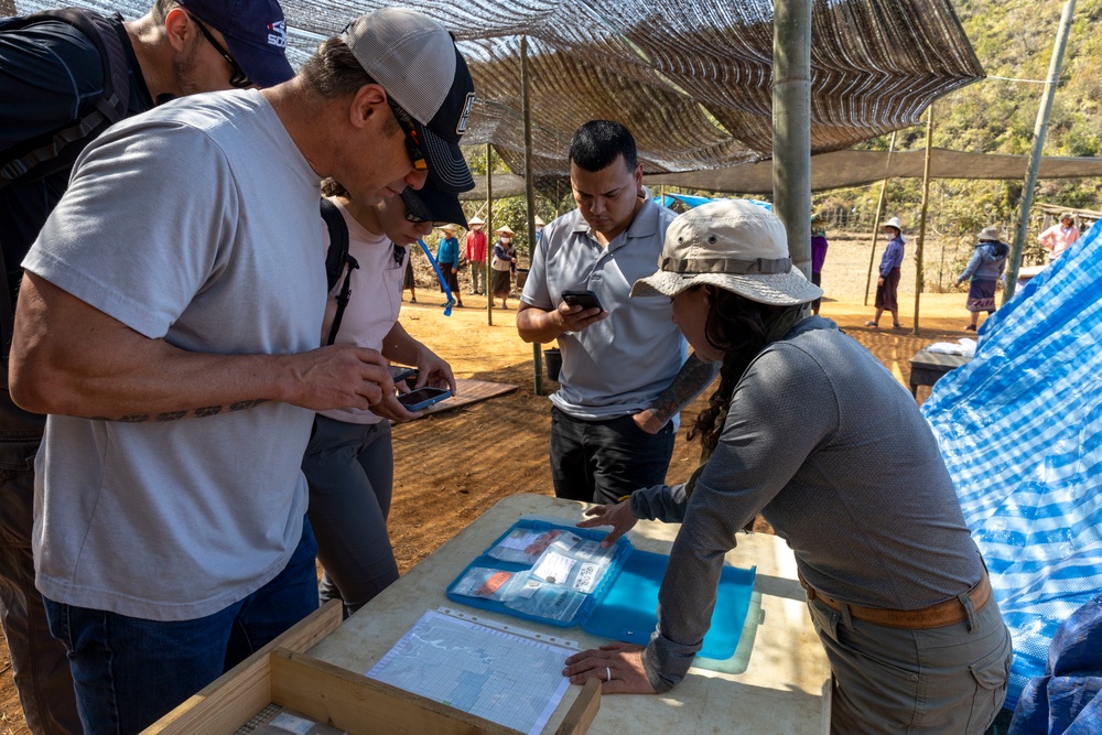 U.S. Embassy personnel and Laos officials visit recovery mission site