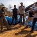 U.S. Embassy personnel and Laos officials visit recovery mission site