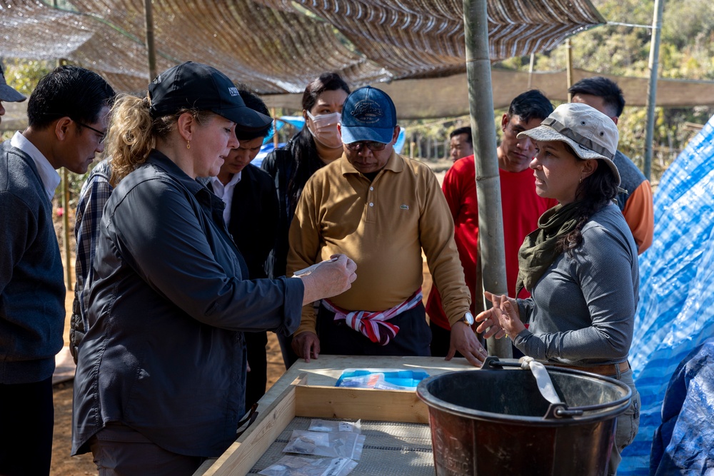 U.S. Embassy personnel and Laos officials visit recovery mission site