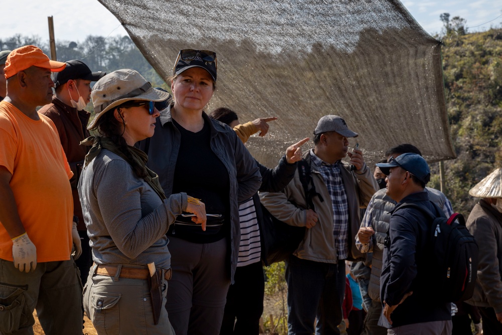 U.S. Embassy personnel and Laos officials visit recovery mission site