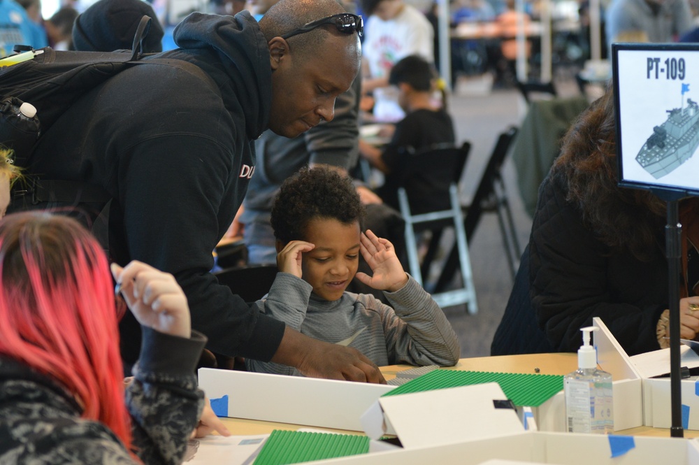 Visitors build LEGO ship models during Naval Museum's 12th Annual Brick by Brick: LEGO Shipbuilding event