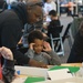 Visitors build LEGO ship models during Naval Museum's 12th Annual Brick by Brick: LEGO Shipbuilding event