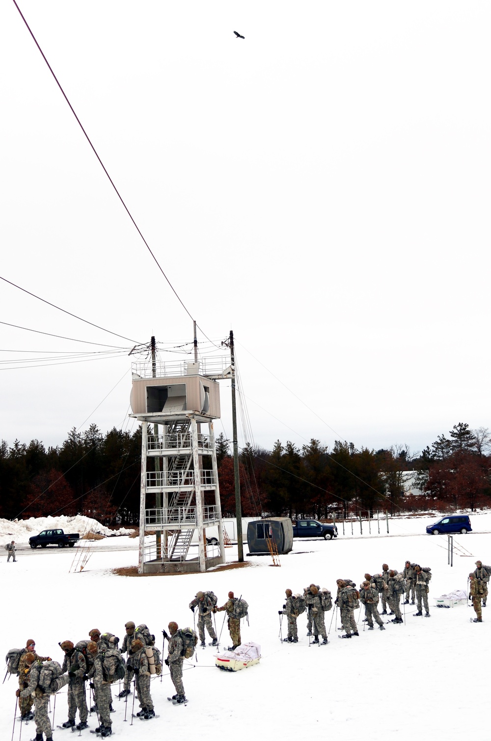 Eagle flies overhead while Airmen train in cold-weather operations, tactics, skills at Fort McCoy