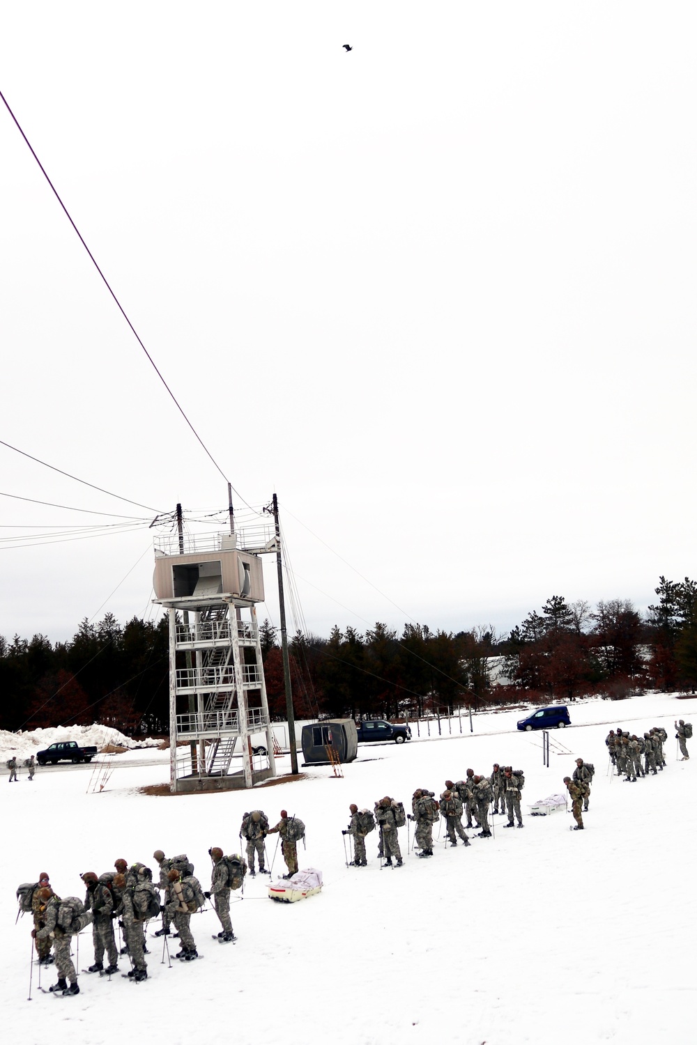 Eagle flies overhead while Airmen train in cold-weather operations, tactics, skills at Fort McCoy