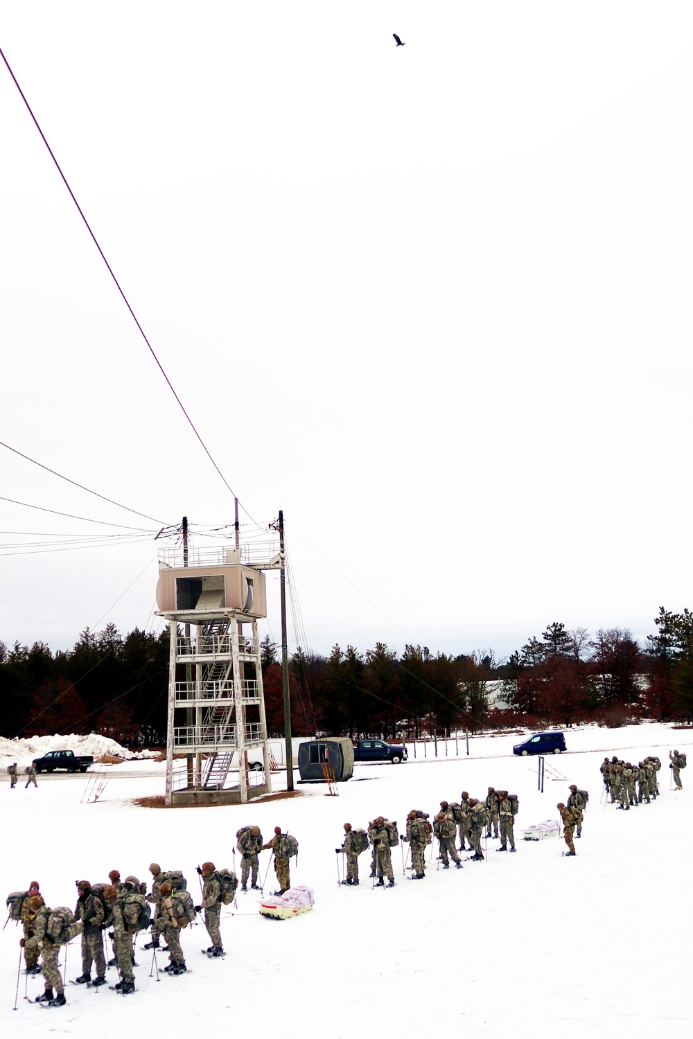 Eagle flies overhead while Airmen train in cold-weather operations, tactics, skills at Fort McCoy