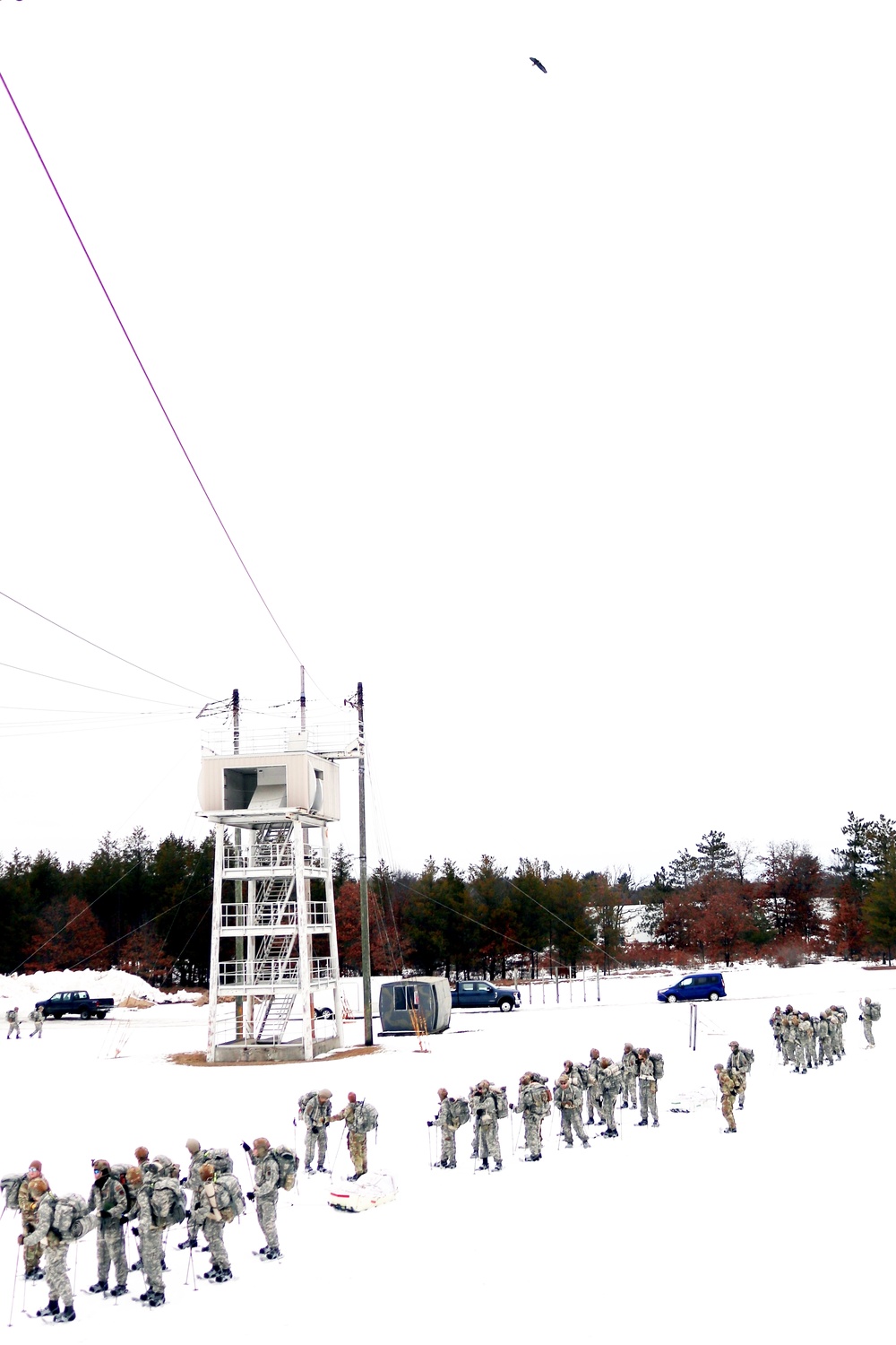 Eagle flies overhead while Airmen train in cold-weather operations, tactics, skills at Fort McCoy