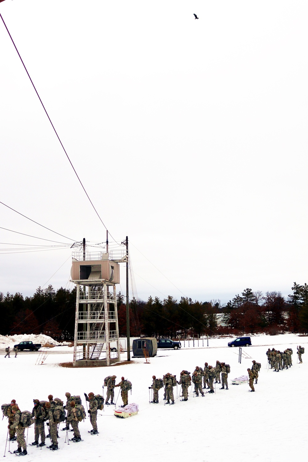 Eagle flies overhead while Airmen train in cold-weather operations, tactics, skills at Fort McCoy