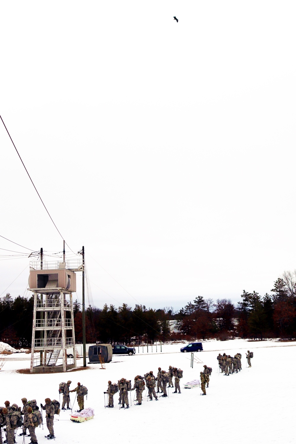 Eagle flies overhead while Airmen train in cold-weather operations, tactics, skills at Fort McCoy