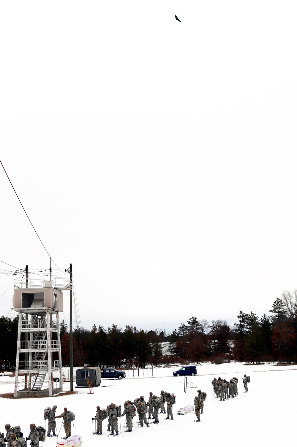 Eagle flies overhead while Airmen train in cold-weather operations, tactics, skills at Fort McCoy