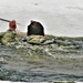 Airmen jump in icy Fort McCoy lake for January cold-water immersion training