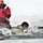 Airmen jump in icy Fort McCoy lake for January cold-water immersion training