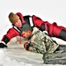 Airmen jump in icy Fort McCoy lake for January cold-water immersion training