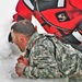 Airmen jump in icy Fort McCoy lake for January cold-water immersion training