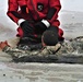 Airmen jump in icy Fort McCoy lake for January cold-water immersion training