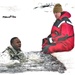 Airmen jump in icy Fort McCoy lake for January cold-water immersion training