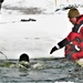 Airmen jump in icy Fort McCoy lake for January cold-water immersion training