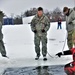 Airmen jump in icy Fort McCoy lake for January cold-water immersion training