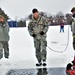 Airmen jump in icy Fort McCoy lake for January cold-water immersion training