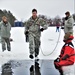 Airmen jump in icy Fort McCoy lake for January cold-water immersion training