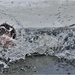 Airmen jump in icy Fort McCoy lake for January cold-water immersion training