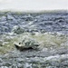 Airmen jump in icy Fort McCoy lake for January cold-water immersion training