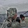 Airmen jump in icy Fort McCoy lake for January cold-water immersion training