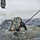 Airmen jump in icy Fort McCoy lake for January cold-water immersion training
