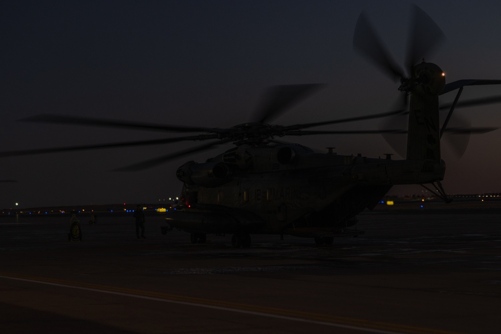 HMH-464 Marines fire into the night