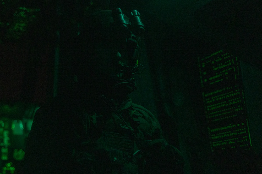 HMH-464 Marines fire into the night
