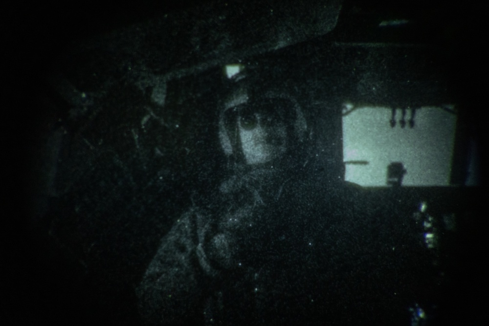 HMH-464 Marines fire into the night