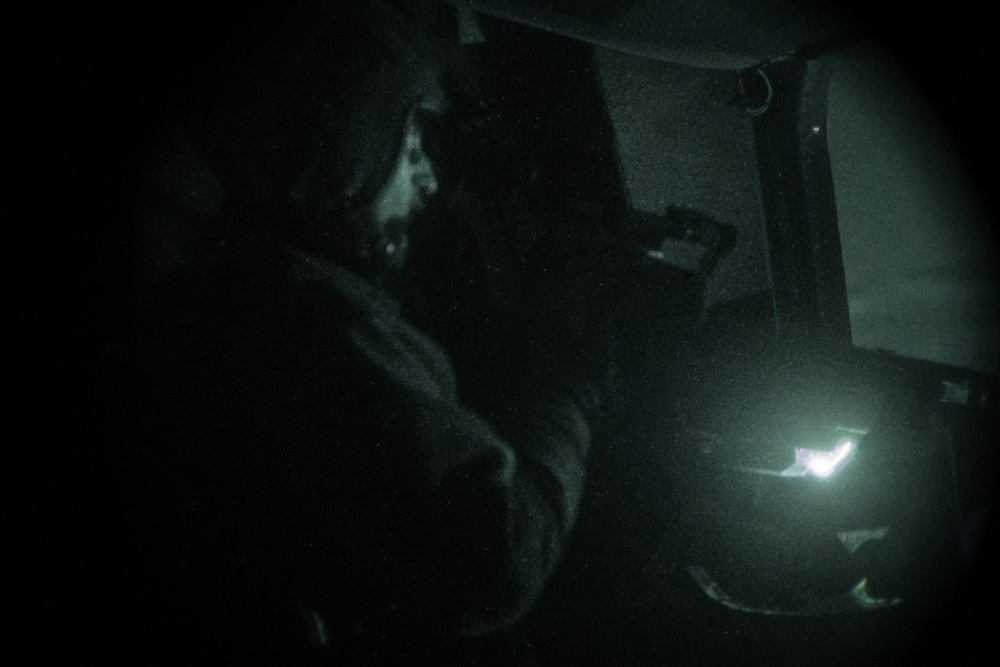 HMH-464 Marines fire into the night