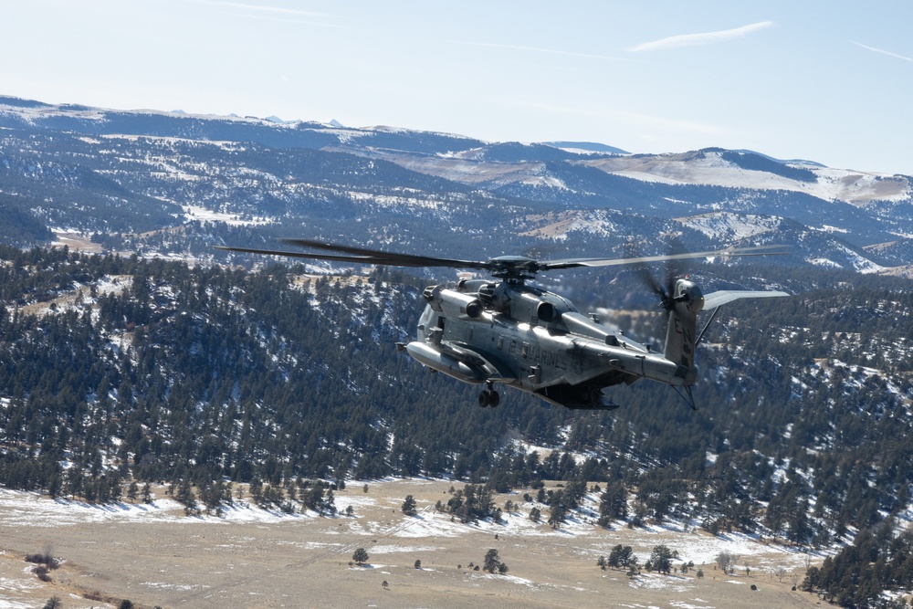 Marines with HMH-464 fly through the Rocky Mountains