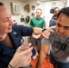 U.S. Navy Sailors prepare for mass casualty drill.