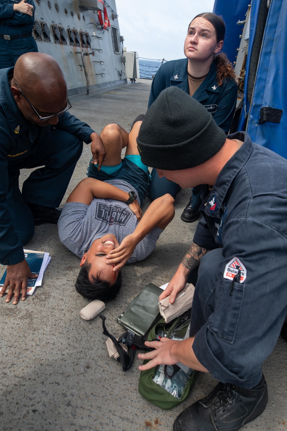 U.S. Navy Sailors conduct mass casualty drill.