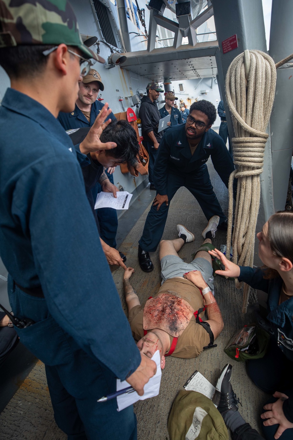 U.S. Navy Sailors conduct mass casualty drill.