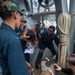 U.S. Navy Sailors conduct mass casualty drill.