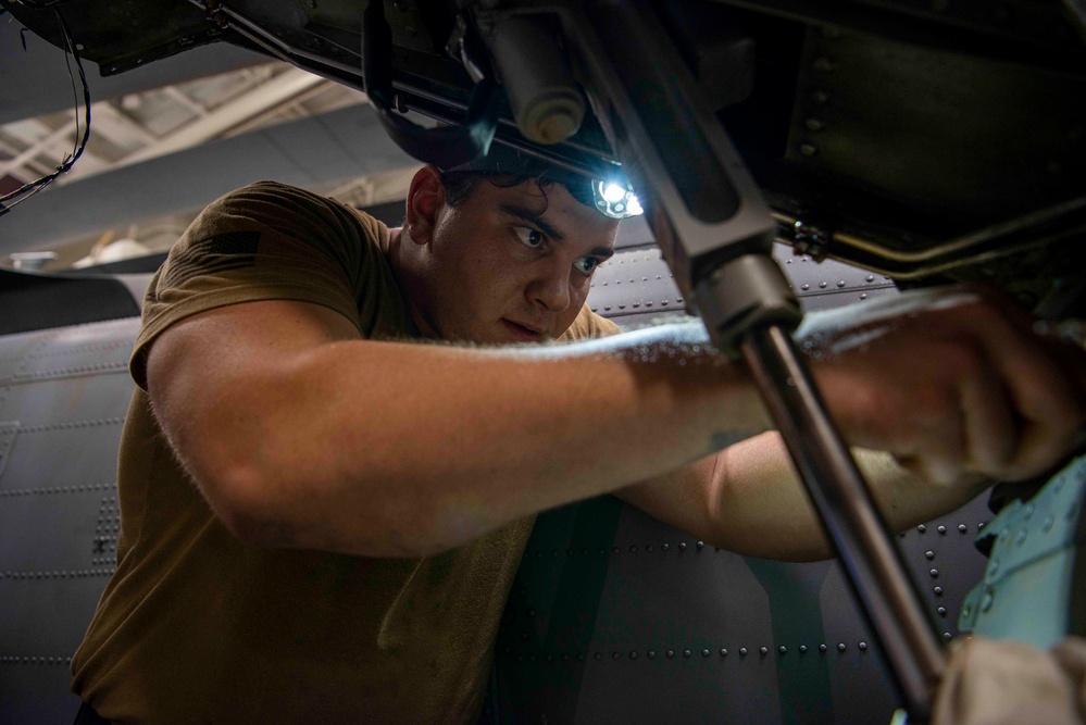 Sailor Performs Maintenance