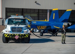 A member of the The U.S. Navy Flight Demonstration Squadron, Blue Angels, prepares for fueling operations in Naval Air Facility (NAF) El Centro during training.