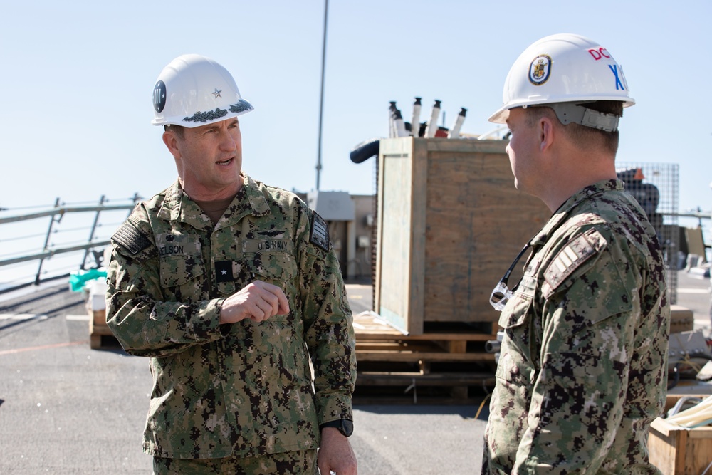 Commander, Task Force 73 Visits Spruance