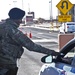 Brown checks identifications at Kirtland gate