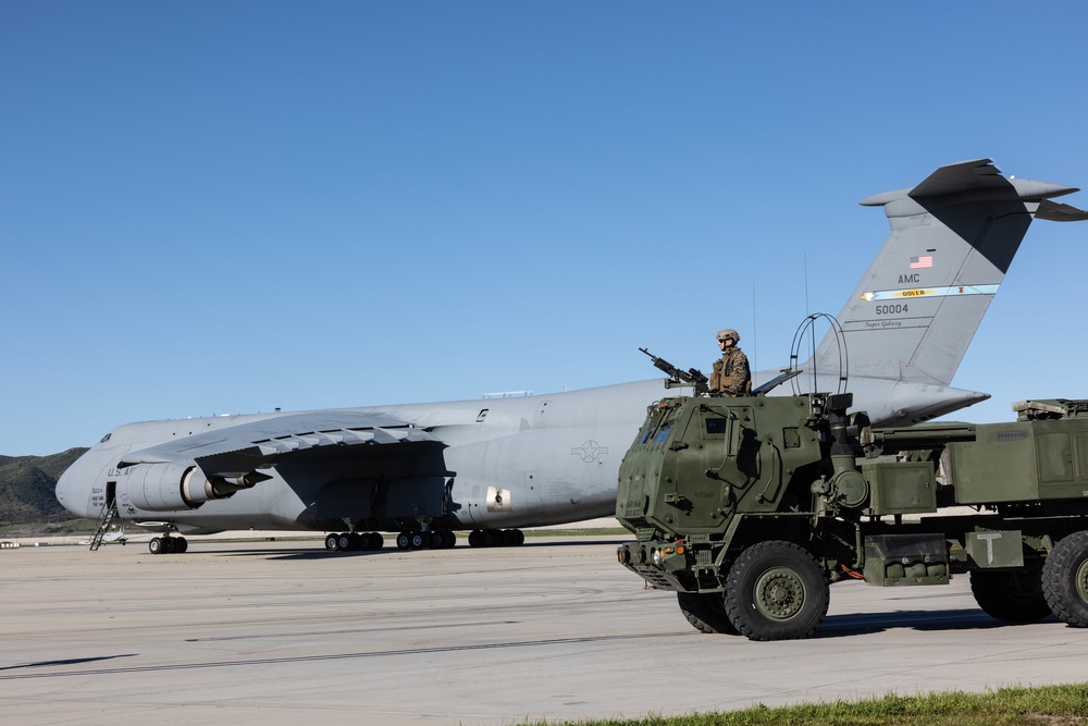 Marines load HIMARS into C-5