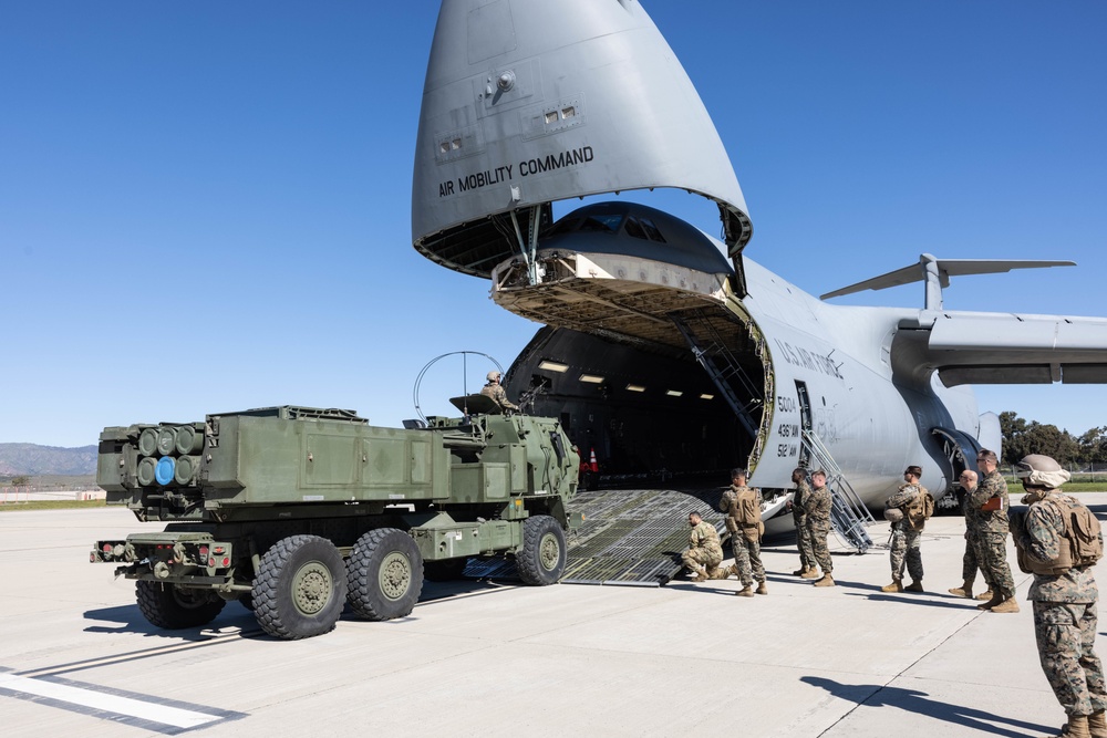 Marines load HIMARS into C-5