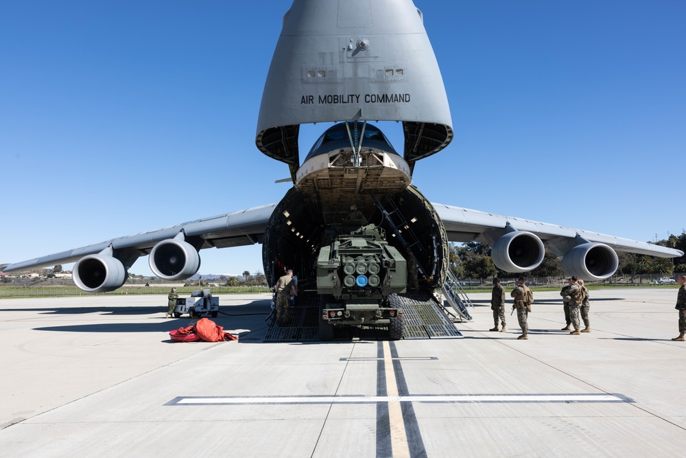 Marines load HIMARS into C-5