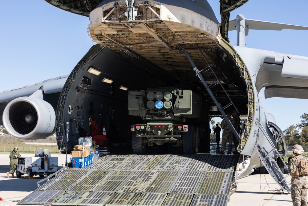 Marines load HIMARS into C-5