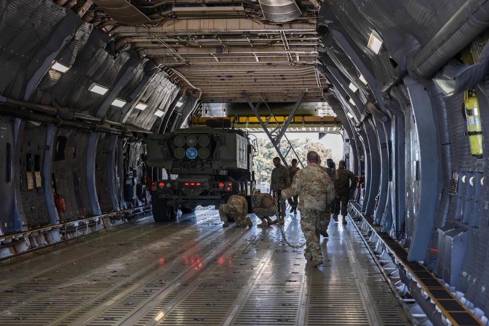 Marines load HIMARS into C-5