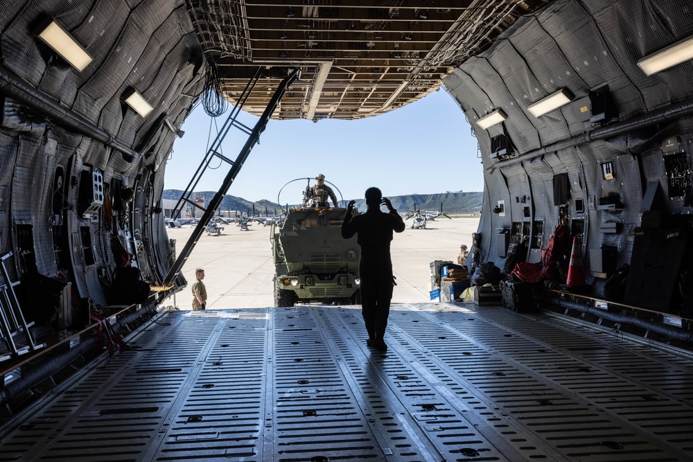 Marines load HIMARS into C-5