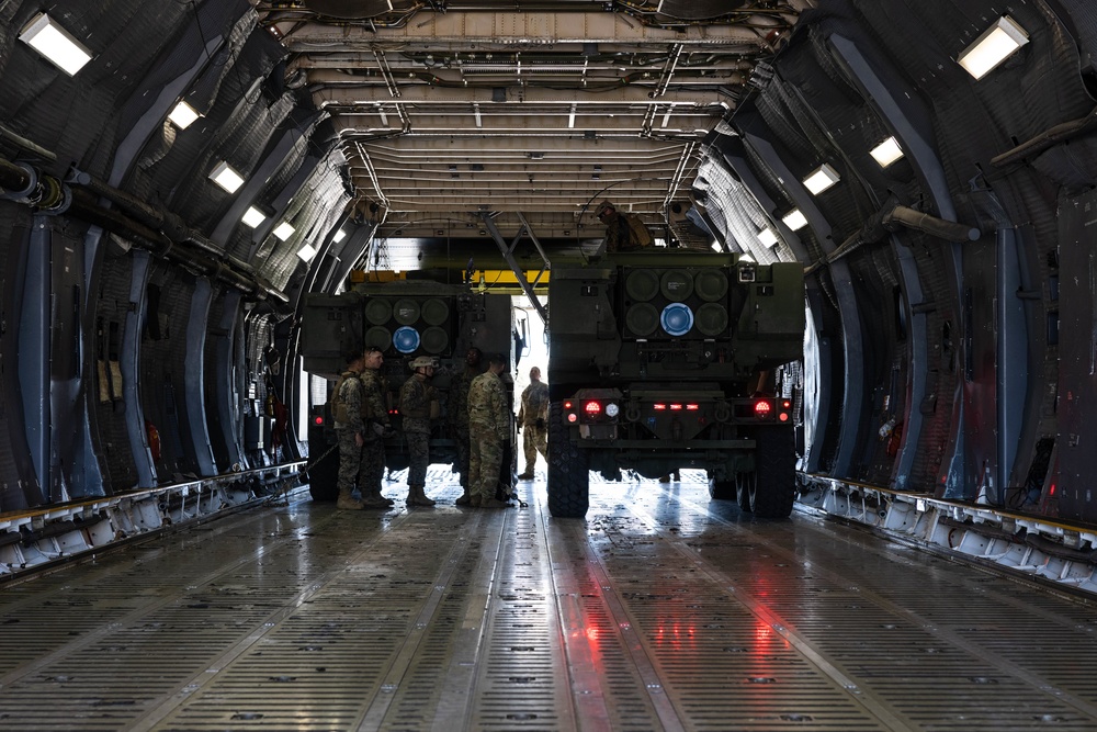 Marines load HIMARS into C-5