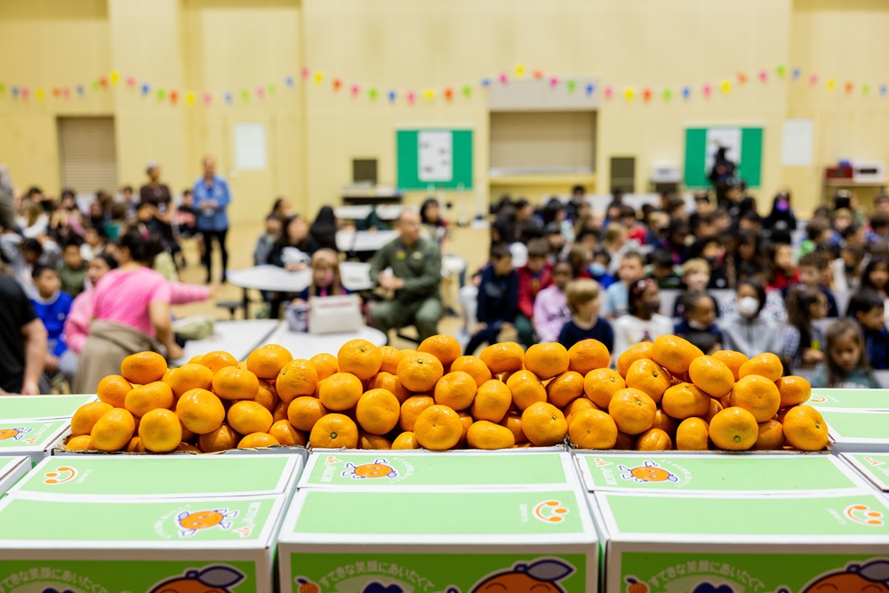 Harvesting Relationships: Marine Corps Air Station Iwakuni and Yamaguchi Prefectural personnel participate in Mikan presentation at Iwakuni Intermediate School