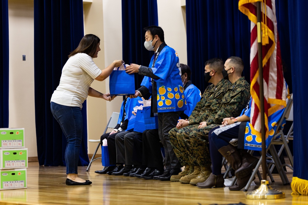 Harvesting Relationships: Marine Corps Air Station Iwakuni and Yamaguchi Prefectural personnel participate in Mikan presentation at Iwakuni Intermediate School